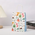 Detail view of cartoon dinosaur gift bag with white rope handles and artistic print - Mixed Dinosaur Pattern (316) / 21x15x5