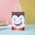 Detail of Halloween paper gift bag with cute vampire cartoon print and white rope handles - White Vampire Style (13)