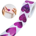 Detailed holographic laser heart stickers on a roll used as a pink envelope seal - 25mm / Purple