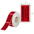 Detail of red warning labels on a roll with This Is A Set Do Not Separate printed text - Do Not Separate Set (OA1)