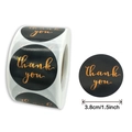 Detail view of 1.5 inch matte black round thank you stickers with gold foil stamping - Black With Gold Text / 1 Inch (ai-500 Pieces/Pack)