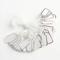 Close-up of white jewelry price tags with silver borders and white cotton strings - Silver Edging 2.6*1.3cm