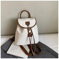 Detail of Korean-style ivory and brown contrast backpack with drawstring and metal lock - White
