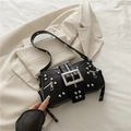 Black leather moto shoulder bag with silver studs and oversized metal buckle - Black