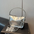 Chic silver metallic handbag with round top handle and silver chain shoulder strap - Silver