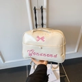 Borsa a spalla bianco crema con fiocco rosa ricamato e pratica tasca anteriore - Bianco