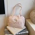 Zaino in pelle verniciata rosa con fiocco argento e manici superiori per donna - Rosa