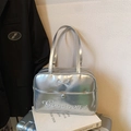 Trendy silver metallic bow backpack with embroidery for fashion-forward women - Silver