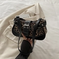 Vintage leopard print shoulder bag with black leather strap and metal buckle detail - Leopard Print Black