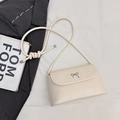 Creamy white small shoulder bag with silver bow clasp and elegant thin strap - Off White