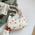 White corduroy underarm bag with red cherry print in a stylish half-moon shape - Cherry Style