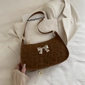 Fashionable leopard print underarm bag with a silver butterfly buckle and brown suede texture - Brown