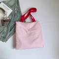 Pink striped canvas tote bag with red handles in a minimalist casual lifestyle setting - Pink White Stripes with Red Handle / Pink