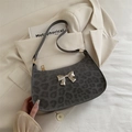 Chic leopard print underarm bag with a large silver bow and elegant gold zipper - Gray