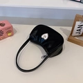 Large black crescent moon shoulder bag with heart-shaped metal buckle in smooth faux leather - Black