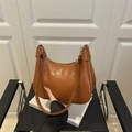 Brown faux leather crescent hobo bag for women with unique triangular strap detail - Brown