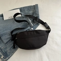 Minimalist black nylon dumpling waist bag with adjustable strap for streetwear style - Black