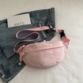 Pink minimalist nylon crossbody dumpling bag with adjustable strap for casual wear - Pink