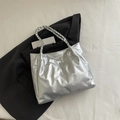 Borsa tote argento metallizzato con trama a pieghe e manici intrecciati dal design elegante - Argento Senza Ciondolo