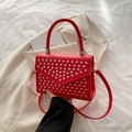 Red crossbody handbag with silver studs and a classic square silhouette for women - Red