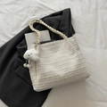 Cream tweed tote bag with woven handles and fluffy cloud charm in a minimalist setting - With Pendant / White