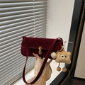 Dark red suede baguette underarm bag with gold twist lock and a cute bear charm - With Pendant / Red