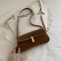 Brown faux suede baguette underarm bag with vintage gold buckle on a beige blazer - Brown No Pendant