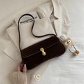 Brown suede baguette shoulder bag with gold metal buckle and plush charm accessory - Brown with Pendant