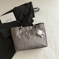 Silver metallic tote bag with pleated texture and plush charm for stylish commuting - Grey With Pendant