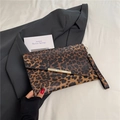 Leopard print clutch bag with golden metal trim and matching wristlet strap for women - Leopard Coffee