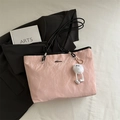 Pink pleated tote bag with black straps and cute plush charm for casual daily use - Pink With Pendant