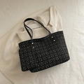 Elegante Tweed-Tragetasche in Schwarz und Gold mit Ledergriffen und passender Minitasche - Schwarz
