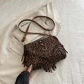 Chic leopard print saddle bag with fringe tassels and adjustable brown leather strap - Leopard Brown