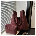 Detail of burgundy leopard print tote bag with matching zipper pouch in natural light - Wine Red Leopard