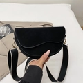 Black suede saddle bag with wavy flap design and wide patterned shoulder strap - Black