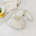 Chic beige corduroy shell-shaped crossbody bag with adjustable strap and dual zippers - Off White