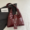 Chic dark red glossy shoulder bag with vintage silver metal studs and eyelets detail - Red