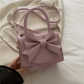 Sac de soirée violet scintillant avec un grand nœud et une poignée métallique - Rose