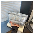 Detailed view of silver metallic quilted square handbag with padded lattice stitching - Silver