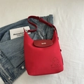 Red large capacity tote bag with dog embossing and bone-shaped metal buckle detail - Red