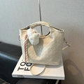 Beige woven tote bag with adjustable shoulder strap and plush dog pendant accessory - With Plush Charm / White