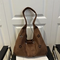 Borsa tote in pelle scamosciata marrone scuro con motivi floreali tagliati al laser - caffè