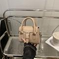 Chic beige mini handbag with silver chain strap and top handle for trendy urban style - Khaki