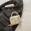 Elegant cream white mini handbag with silver chain strap and top handle for women - White