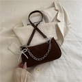 Dark brown suede underarm bag with silver chain and pearl bow pendant detail - Coffee
