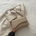 Minimalist beige underarm bag with asymmetric flap on a stylish cream blazer - Khaki