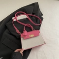 Pink and beige crossbody bag in canvas and leather patchwork with a gold twist lock - Pink