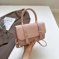 Pink woven leather messenger bag with gold clasp and adjustable shoulder strap - Pink