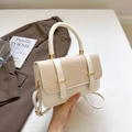 Chic beige woven flap crossbody messenger bag with round top handle and gold clasp - White