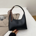 Black half-moon underarm bag with a decorative brown floral silk scarf on the handle - Black
